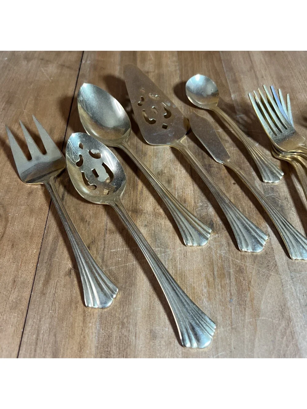 International Stainless Golden Flair Place Setting For 4 + Serving Pieces
